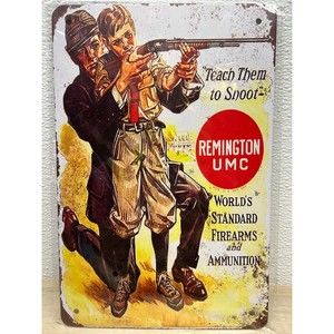 Vintage Rmington UMC Teach Them To Shoot Tin Sign Wall Decor Plaque